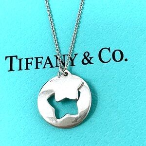 Authentic Tiffany &Co Stencil Cutout Double Star Pendant Necklace.